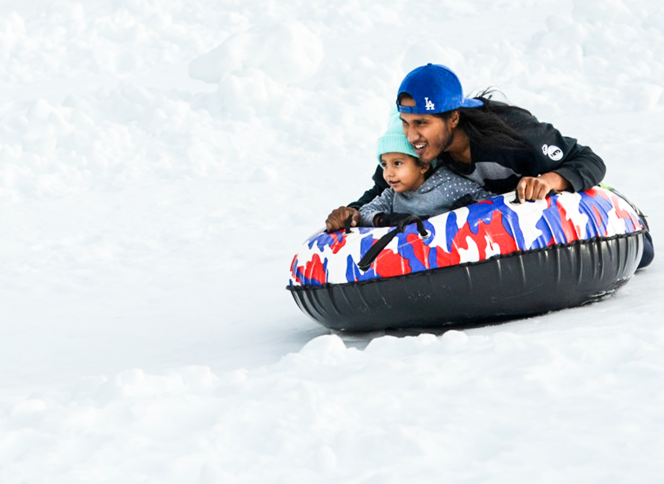 Snow Tube - Experience the thrill of snow tubing and sliding down snowy slopes