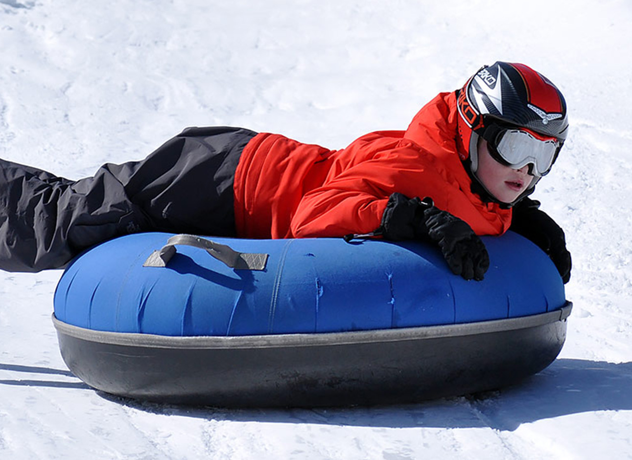 Snow Tube - Experience the thrill of snow tubing and sliding down snowy slopes