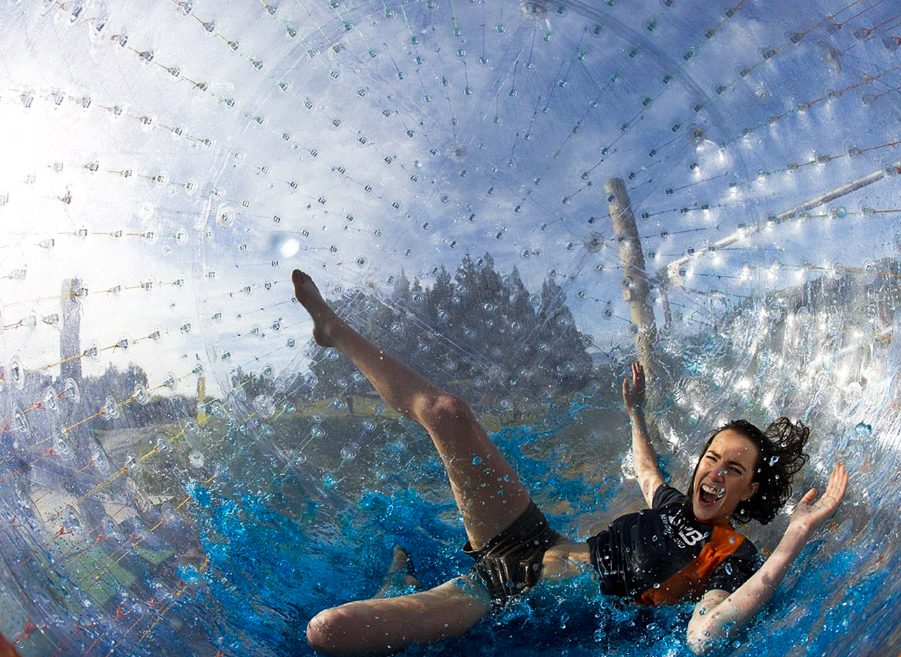 Zorbing - Enjoy the excitement of zorbing and rolling down hills in an inflatable ball