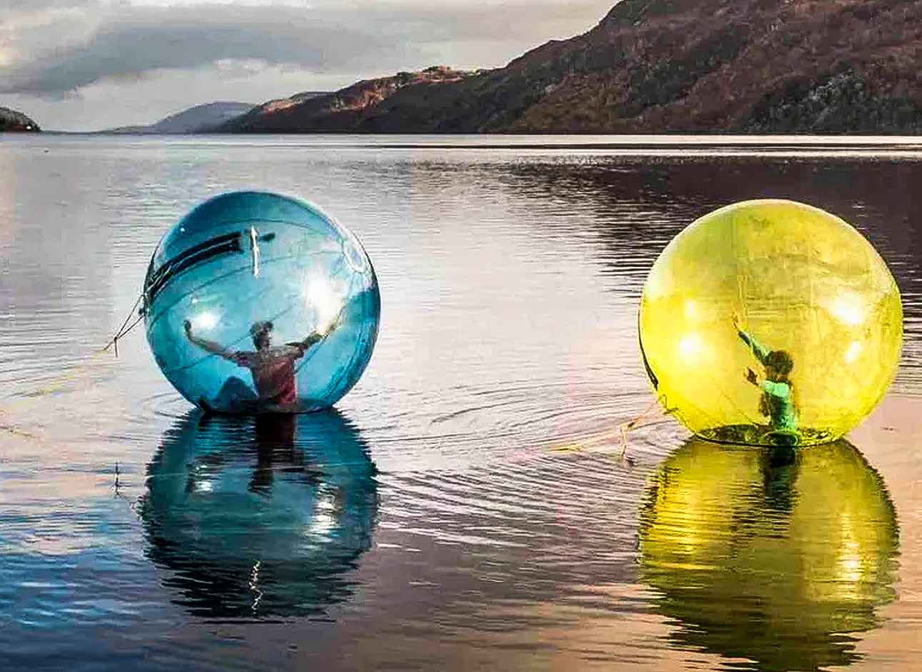 Zorbing - Enjoy the excitement of zorbing and rolling down hills in an inflatable ball