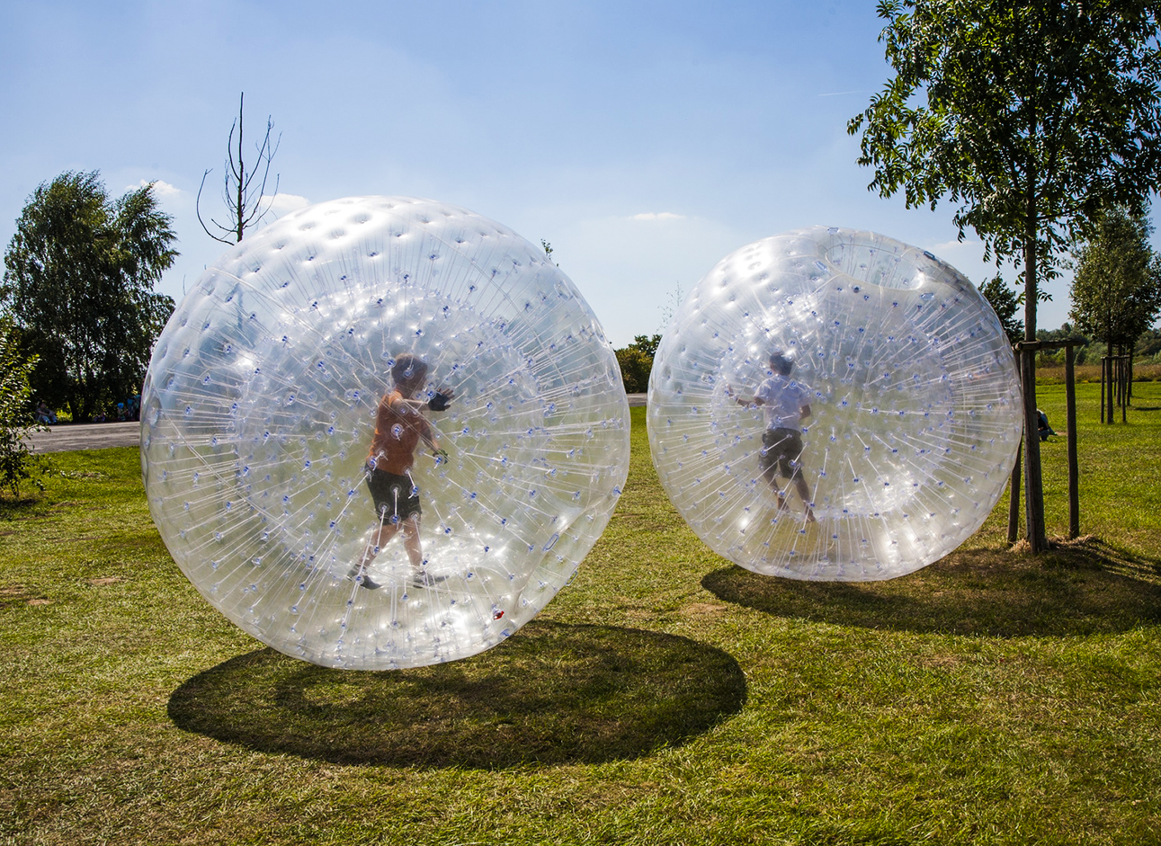 Zorbing - Enjoy the excitement of zorbing and rolling down hills in an inflatable ball