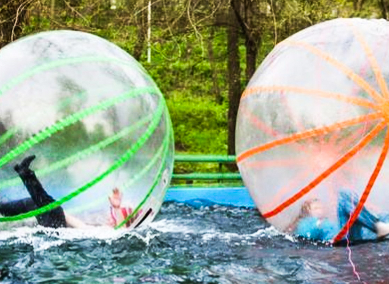 Zorbing - Enjoy the excitement of zorbing and rolling down hills in an inflatable ball