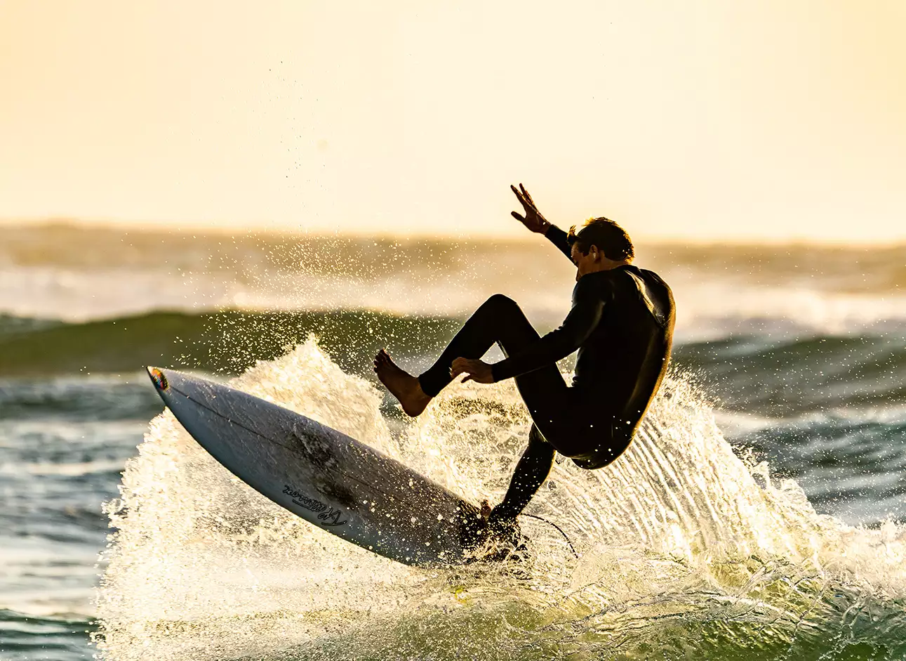 Surfing - Catch thrilling waves and ride the surf for an adrenaline-pumping experience