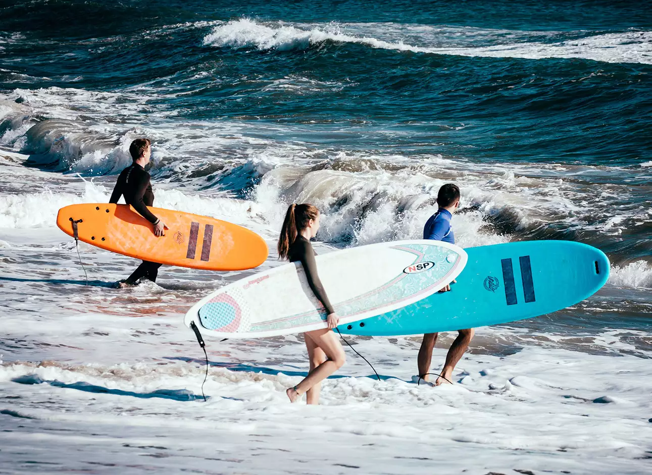 Surfing - Catch thrilling waves and ride the surf for an adrenaline-pumping experience